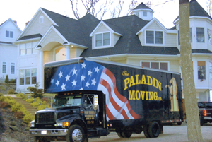 Photo of a Paladin truck at a large suburban home. Paladin Moving Company moves people into and out of homes of all sizes.